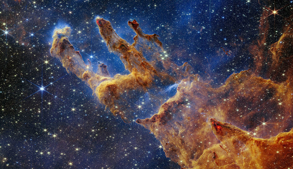 Pillars of Creation photographed by James Webb Space Telescope NIRCam in 2022 — gas and dust pillars in the Eagle Nebula M16 with young protostars